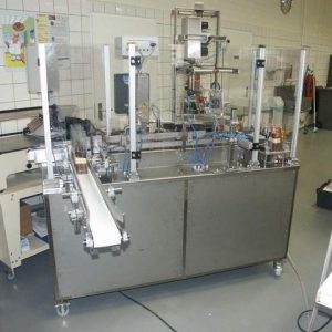 IMH SFLU-01 Block bottom bags seal, folded and head labeling machine.